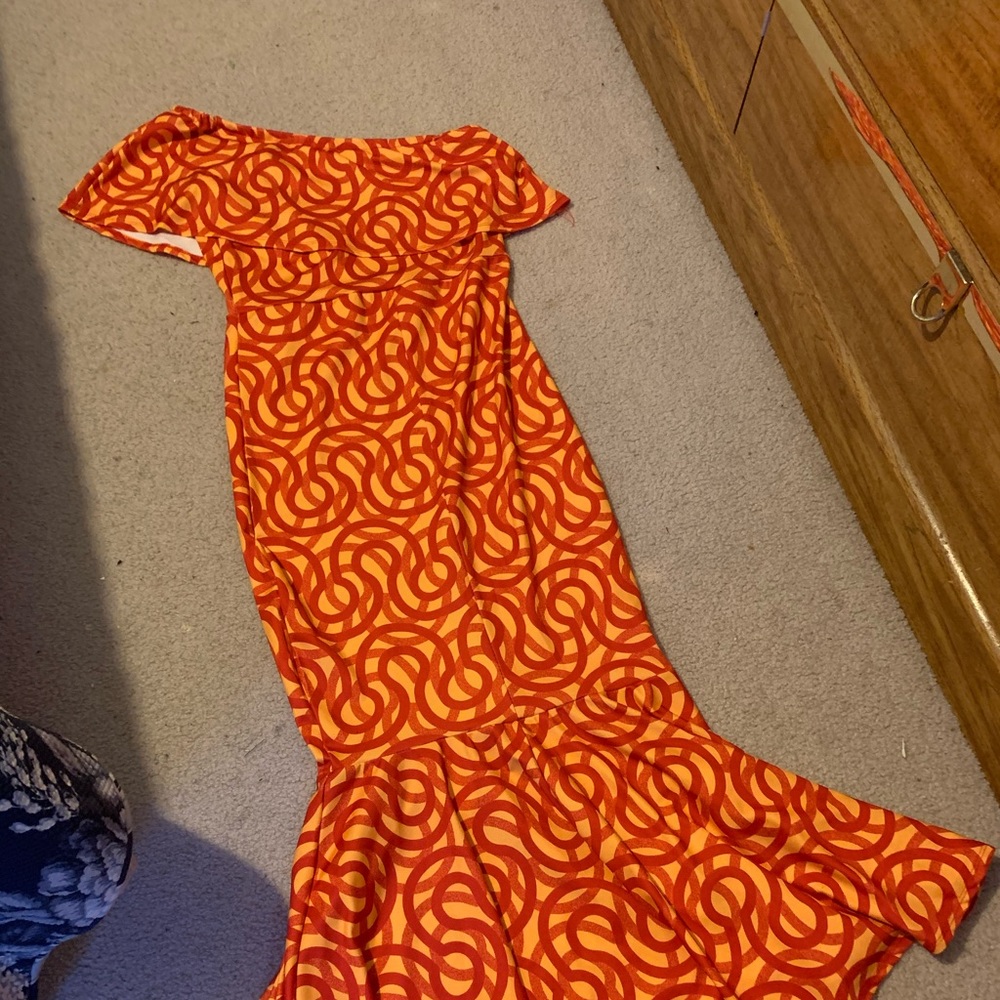 The dress fit great. Love the material.